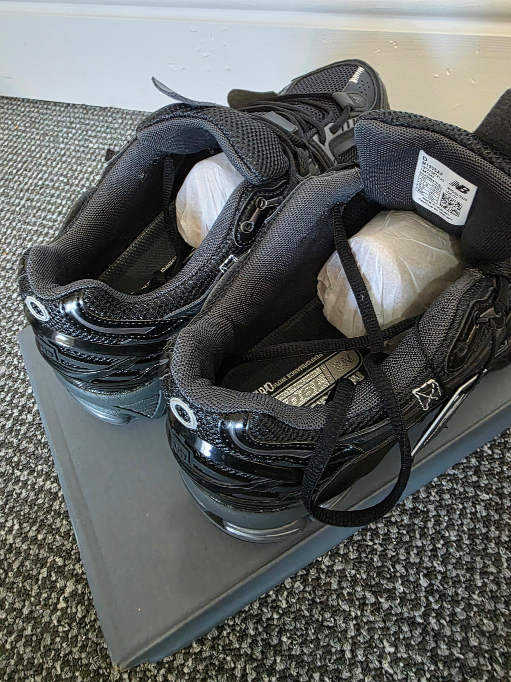 Sneakers showing the tread and design, highlighting comfort and style in authentic designer footwear.