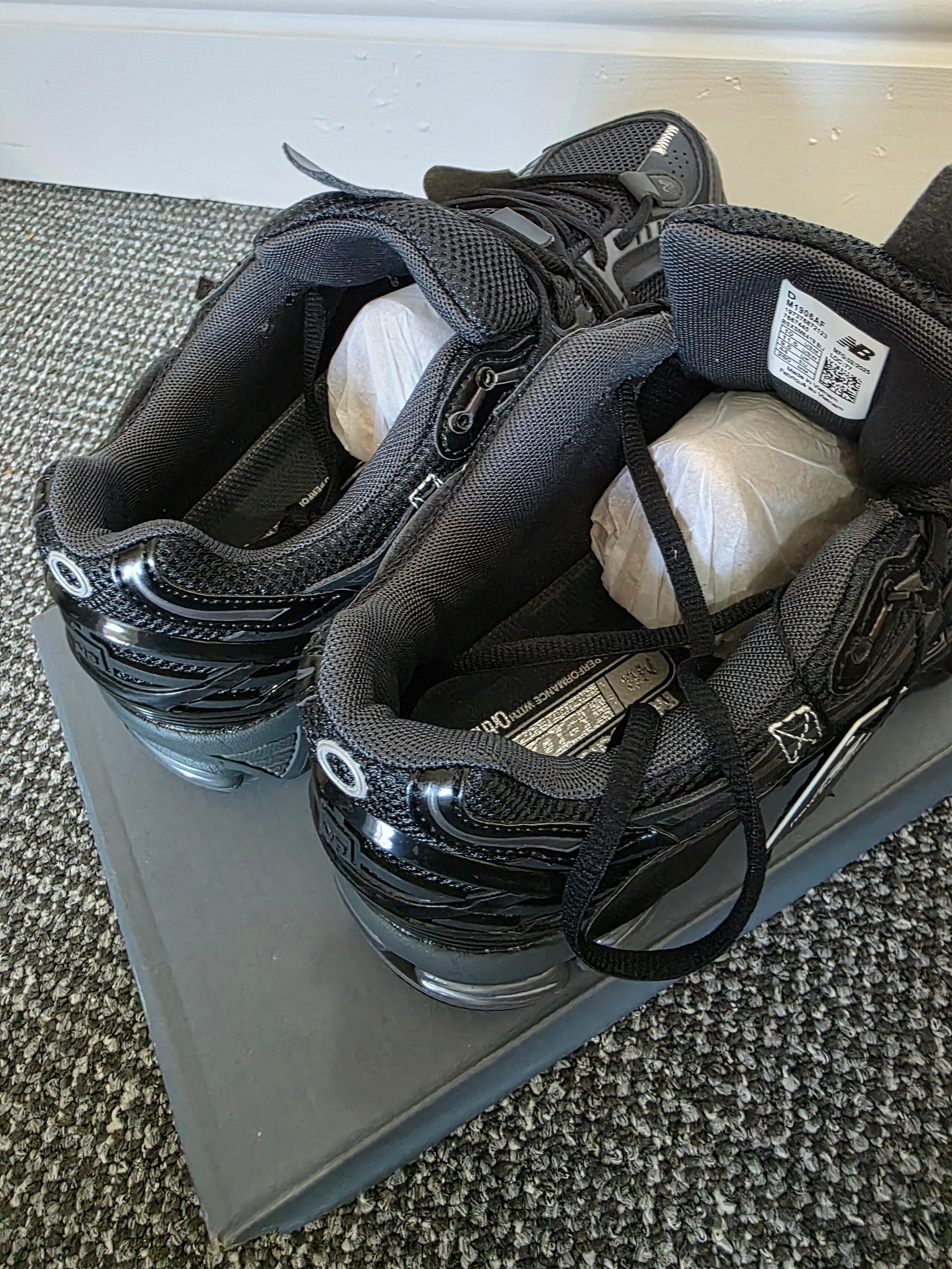 Sneakers showing the tread and design, highlighting comfort and style in authentic designer footwear.