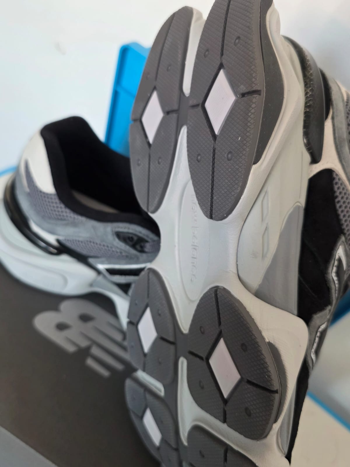 New Balance 9060s shoe sole view, showcasing grip and design details.